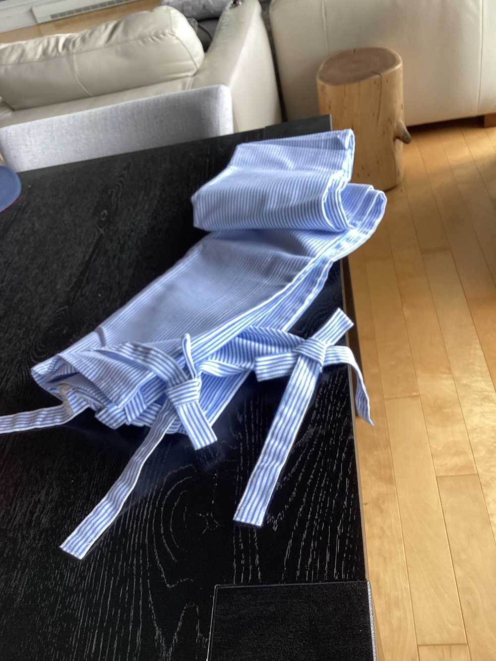 Striped Blue tablecloth with ties.
52 x 71”.NWT